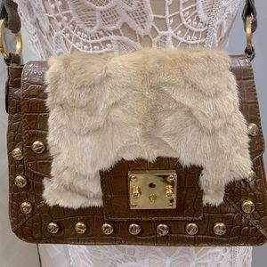 Mink and leather women’s shoulder bag.